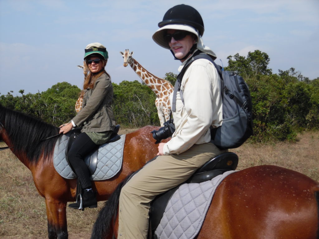 Horse ride safari, Aberdare Country Club, Kenya, giraffe, couple